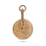 AN ANTIQUE LOCKET PENDANT the round pendant engraved with foliate design, opening to reveal two g...