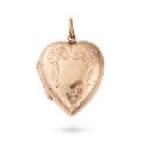 AN ANTIQUE HEART LOCKET PENDANT in yellow gold, the hinged heart shaped pendant engraved with fol...