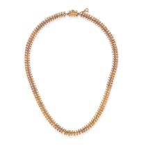 AN ANTIQUE GOLD NECKLACE in 14ct yellow gold, comprising a row of fancy links accented by beads, ...