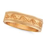 CARLO GIULIANO, AN ANTIQUE BANGLE in yellow gold, the hinged bangle with applied foliate motifs, ...