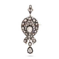 AN ANTIQUE DIAMOND PENDANT / BROOCH in yellow gold and silver, set with a principal pear shape ro...