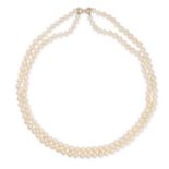 A PEARL AND YELLOW DIAMOND NECKLACE set with two rows of pearls, the bow-shaped clasp set with ro...