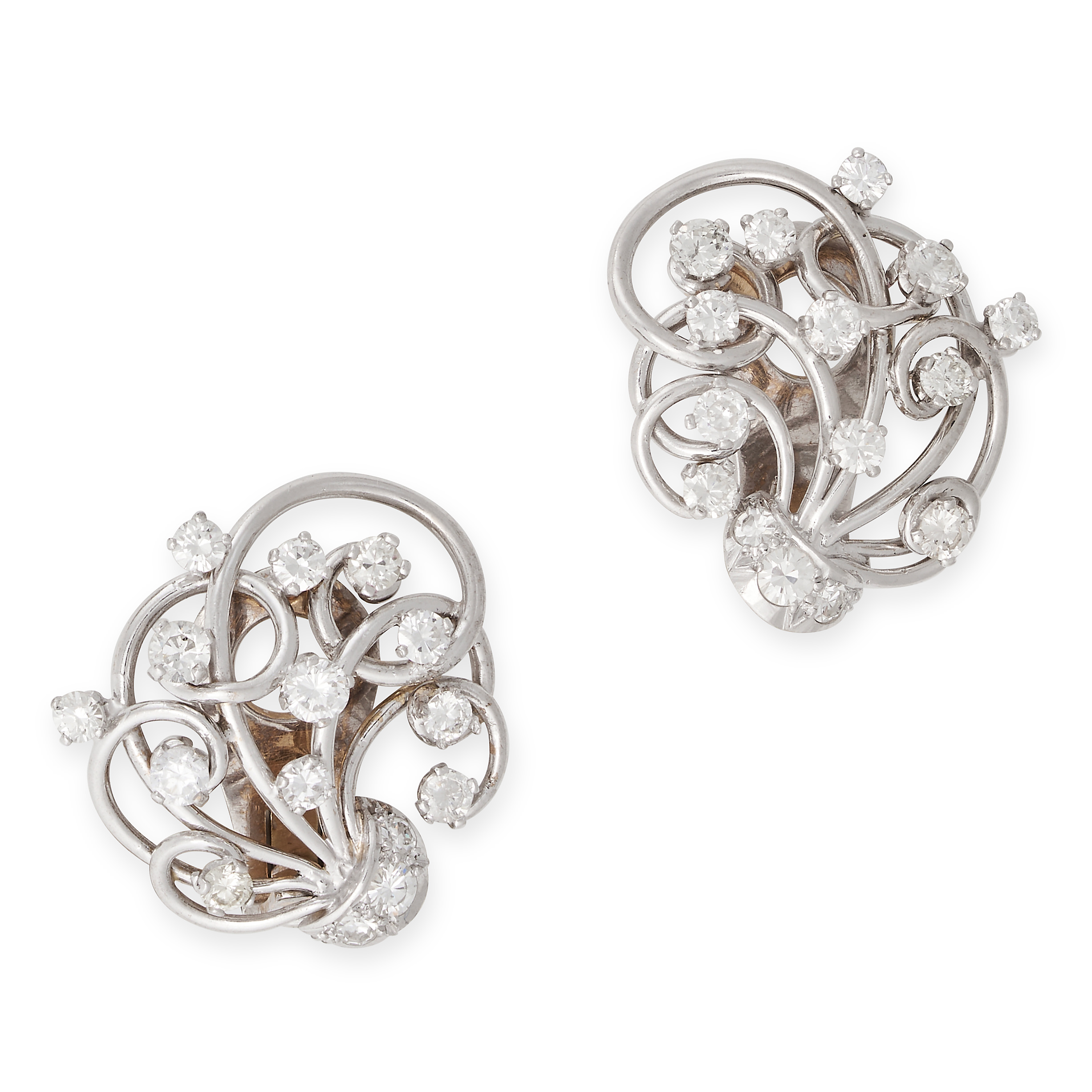 A PAIR OF VINTAGE DIAMOND CLIP EARRINGS in 18ct white gold, the scrolling openwork earrings set t...