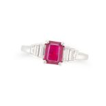 A BURMESE RUBY AND DIAMOND RING set with an octagonal step cut ruby of 1.07 carats, the stepped s...