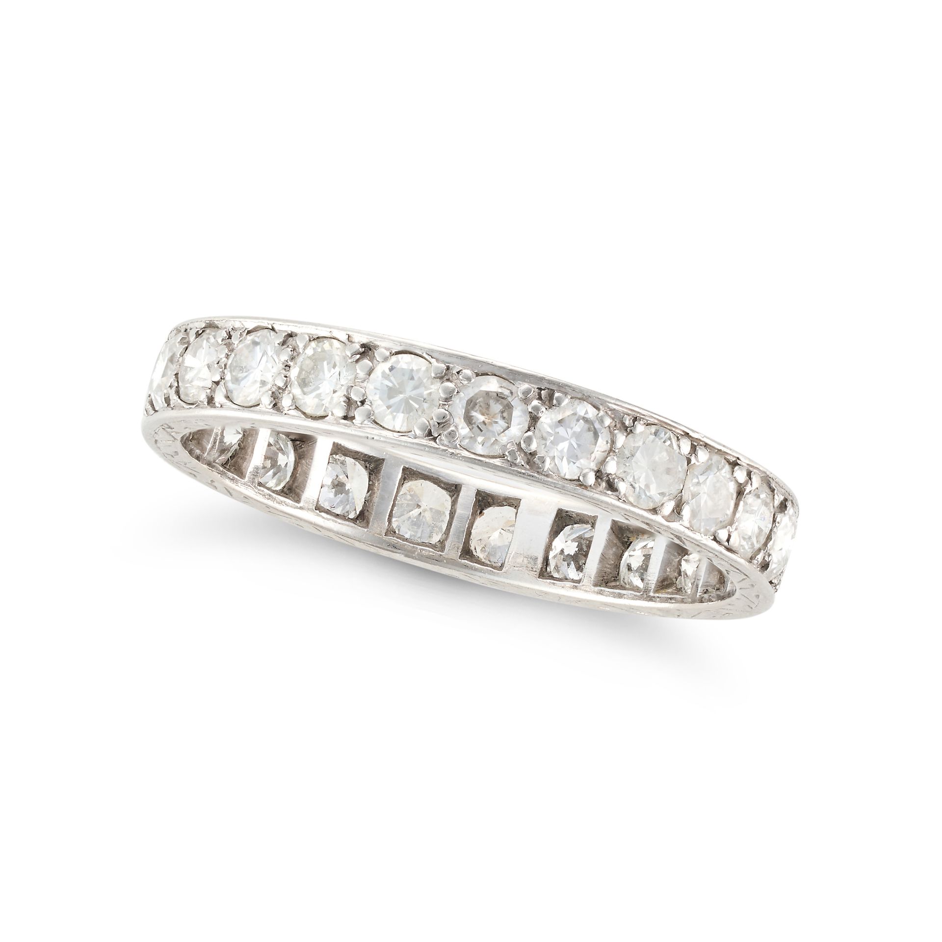A DIAMOND FULL ETERNITY RING set all around with with a row of round brilliant cut diamonds, the ...