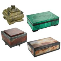 A COLLECTION OF FOUR HARDSTONE BOXES comprising a rectangular hinged box set with polished malach...