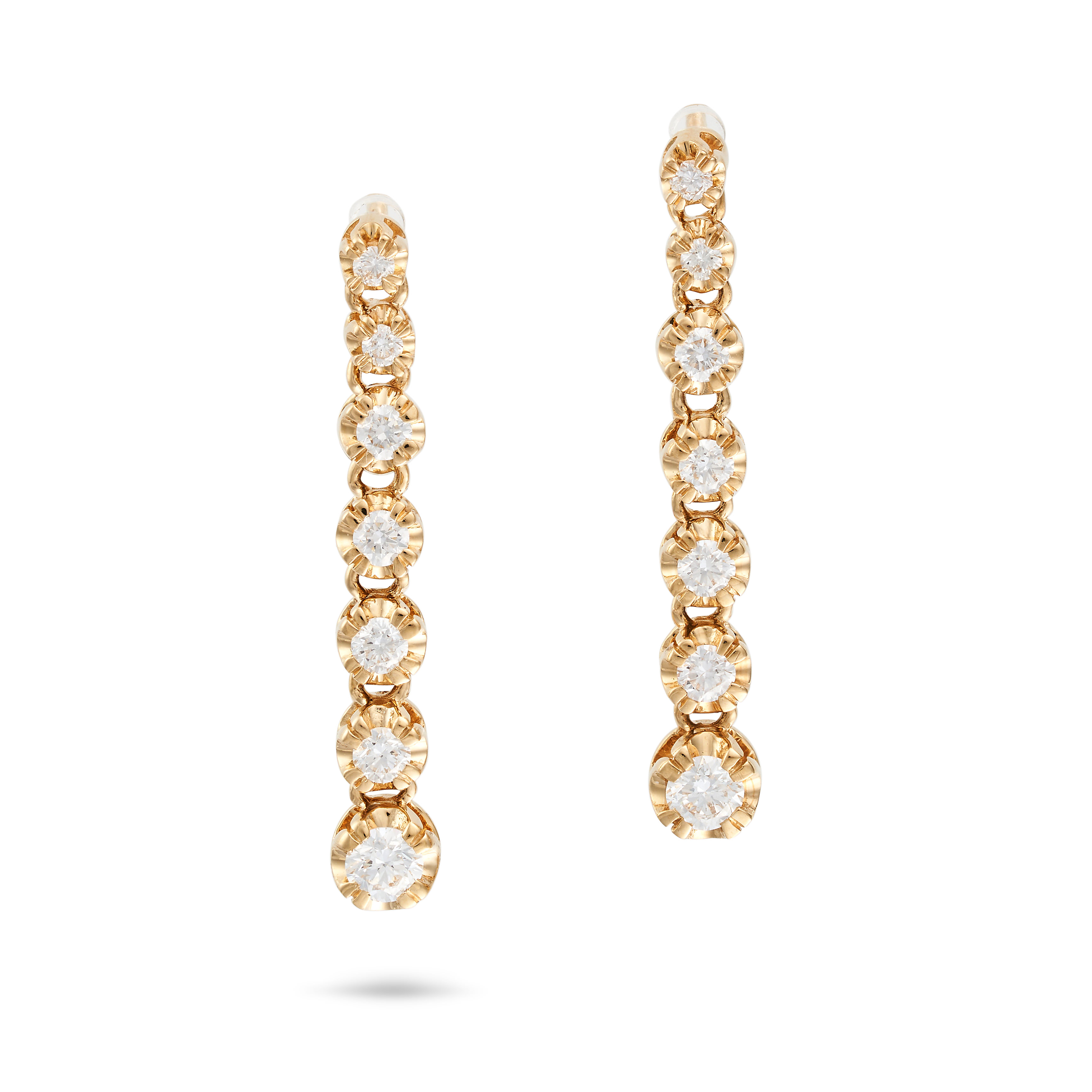 A PAIR OF DIAMOND DROP EARRINGS each set with a graduating row of round brilliant cut diamonds, n...