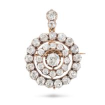 AN ANTIQUE DIAMOND BROOCH / PENDANT in yellow gold and silver, set with an old European cut diamo...