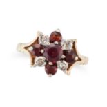 A GARNET AND DIAMOND CLUSTER RING in 9ct yellow gold, set with a round cut garnet in a cluster of...