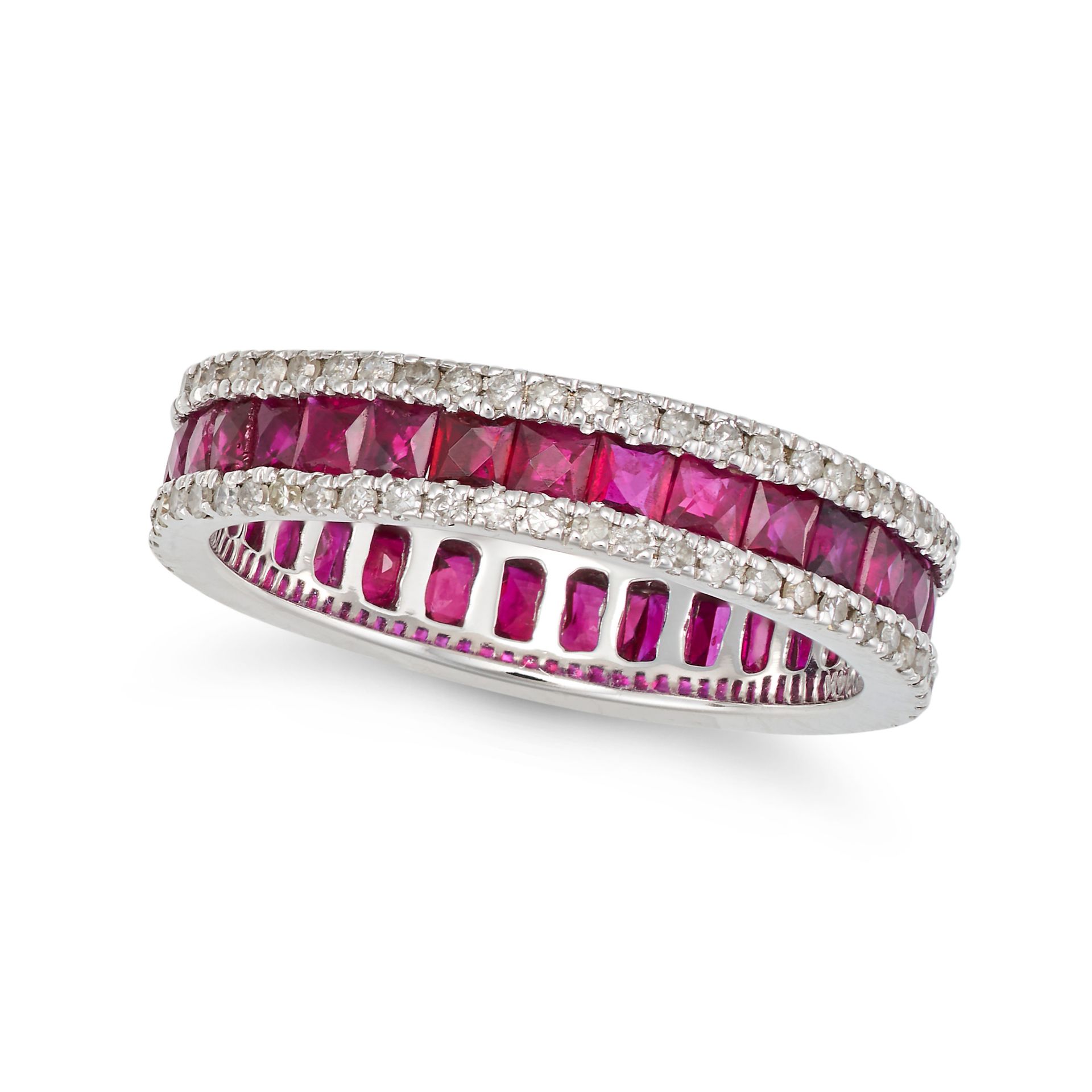 A RUBY AND DIAMOND ETERNITY RING set all around with a row of square step cut rubies accented by ...