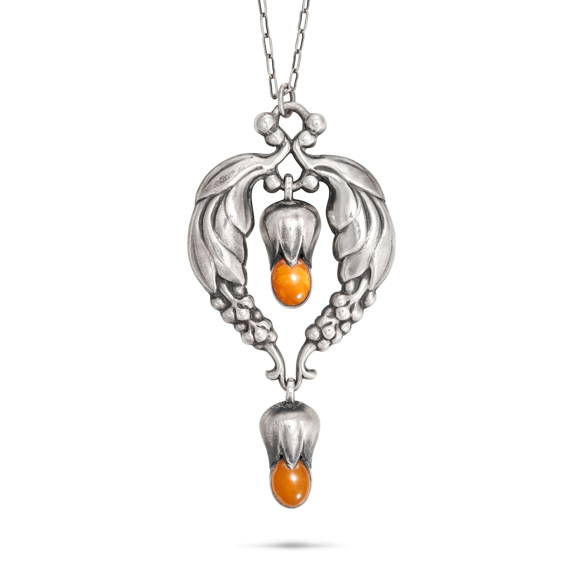 GEORG JENSEN, AN AMBER NECKLACE in silver, design number 51, the foliate pendant set with cabocho...