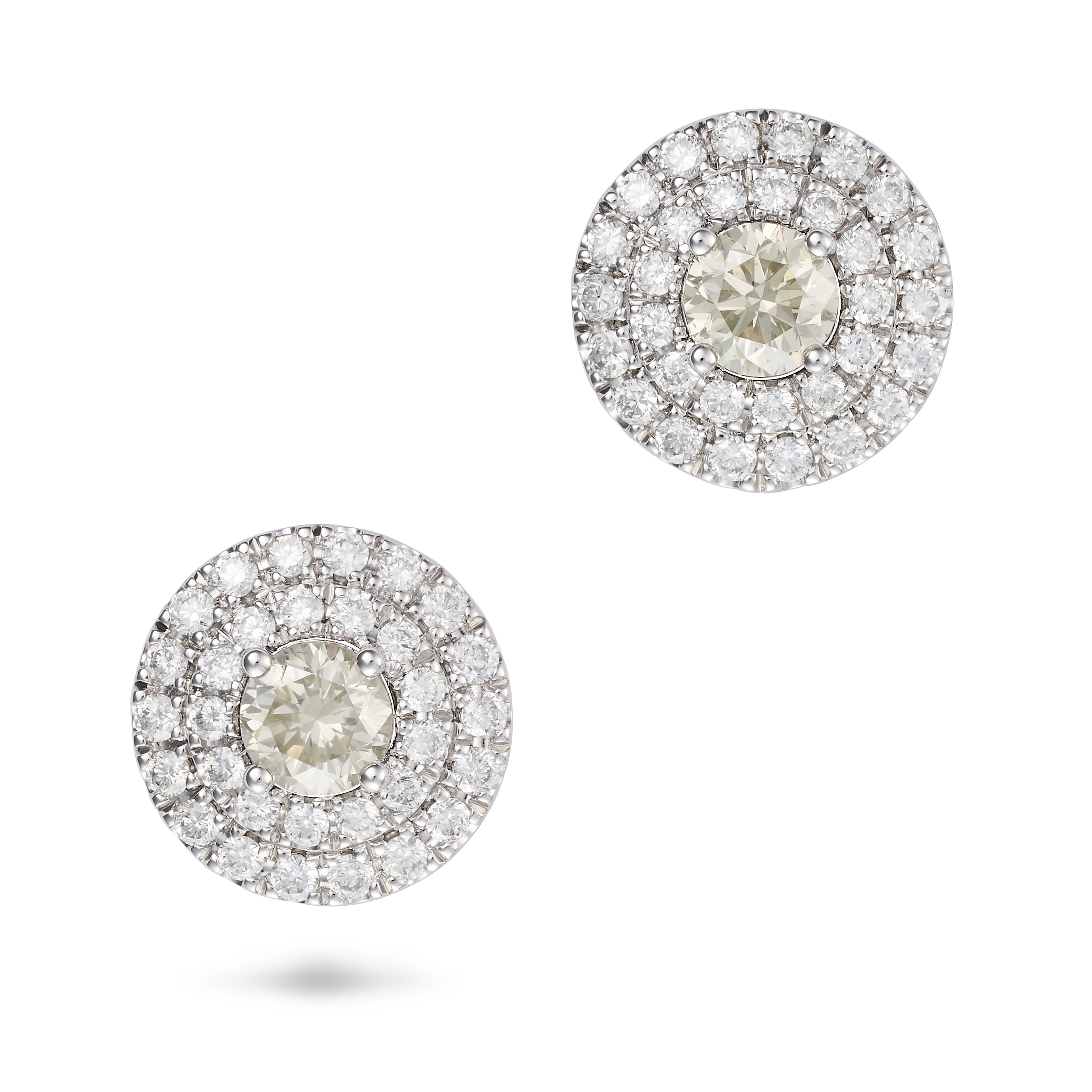 A PAIR OF DIAMOND CLUSTER EARRINGS each set with a round brilliant cut diamond in a double cluste...