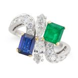 A SAPPHIRE, EMERALD AND DIAMOND RING set with an octagonal step cut sapphire and emerald, accente...