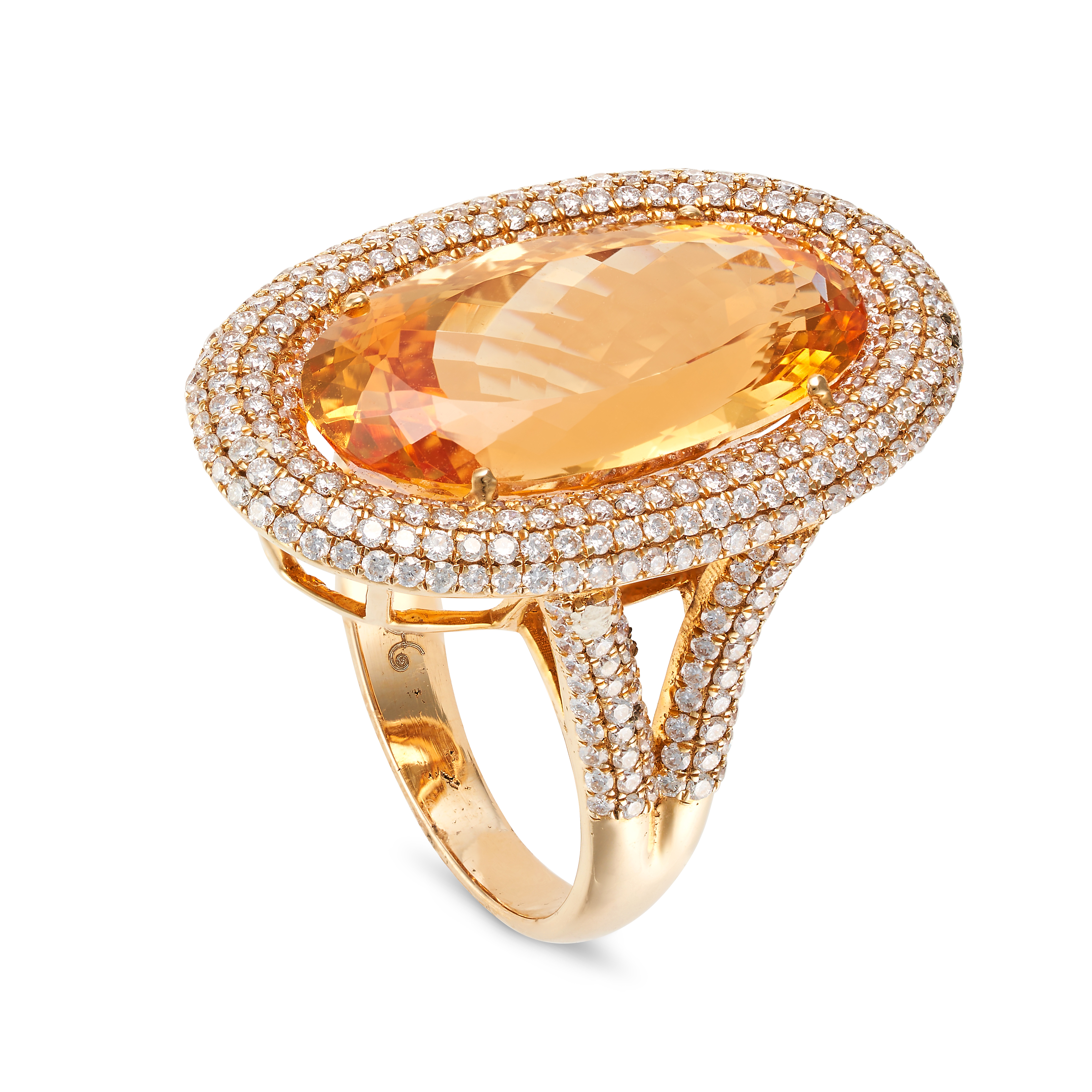 A TOPAZ AND DIAMOND RING set with an oval cut topaz of 15.52 carats in a border of pave set round... - Image 2 of 2