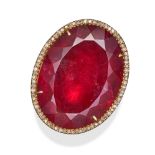 A RUBELLITE TOURMALINE AND DIAMOND RING set with an oval cut rubellite tourmaline in a border of ...