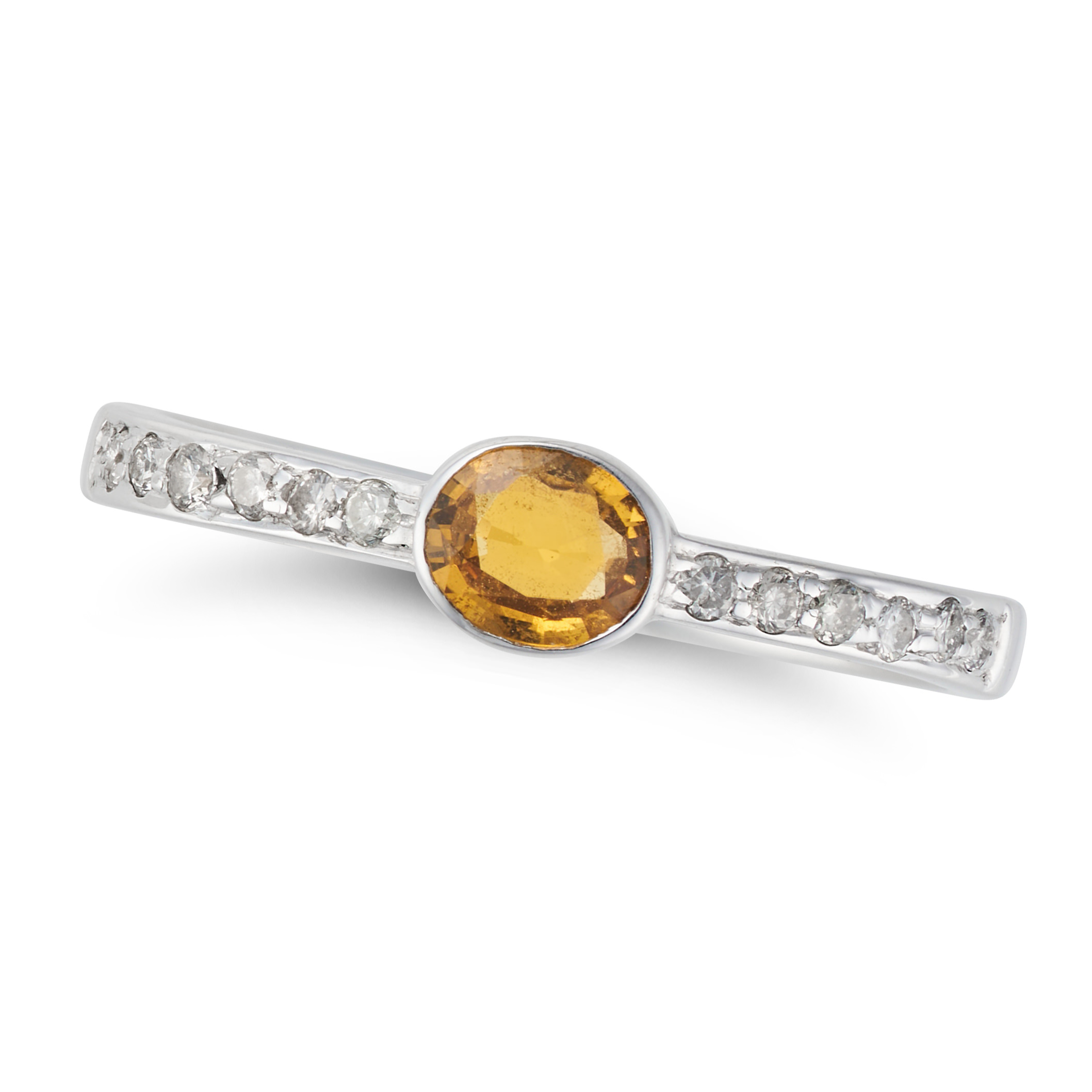 A YELLOW SAPPHIRE AND DIAMOND RING set with an oval cut yellow sapphire accented by round cut dia...