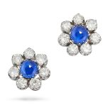 A PAIR OF CEYLON NO HEAT SAPPHIRE AND DIAMOND CLUSTER EARRINGS each set with a round cabochon sap...