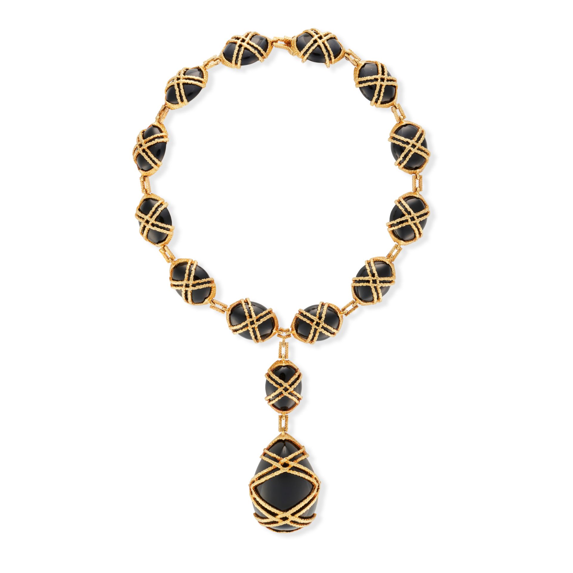 CARTIER, A FINE VINTAGE ONYX NECKLACE, 1960s in 18ct yellow gold, comprising a row of oval caboch...