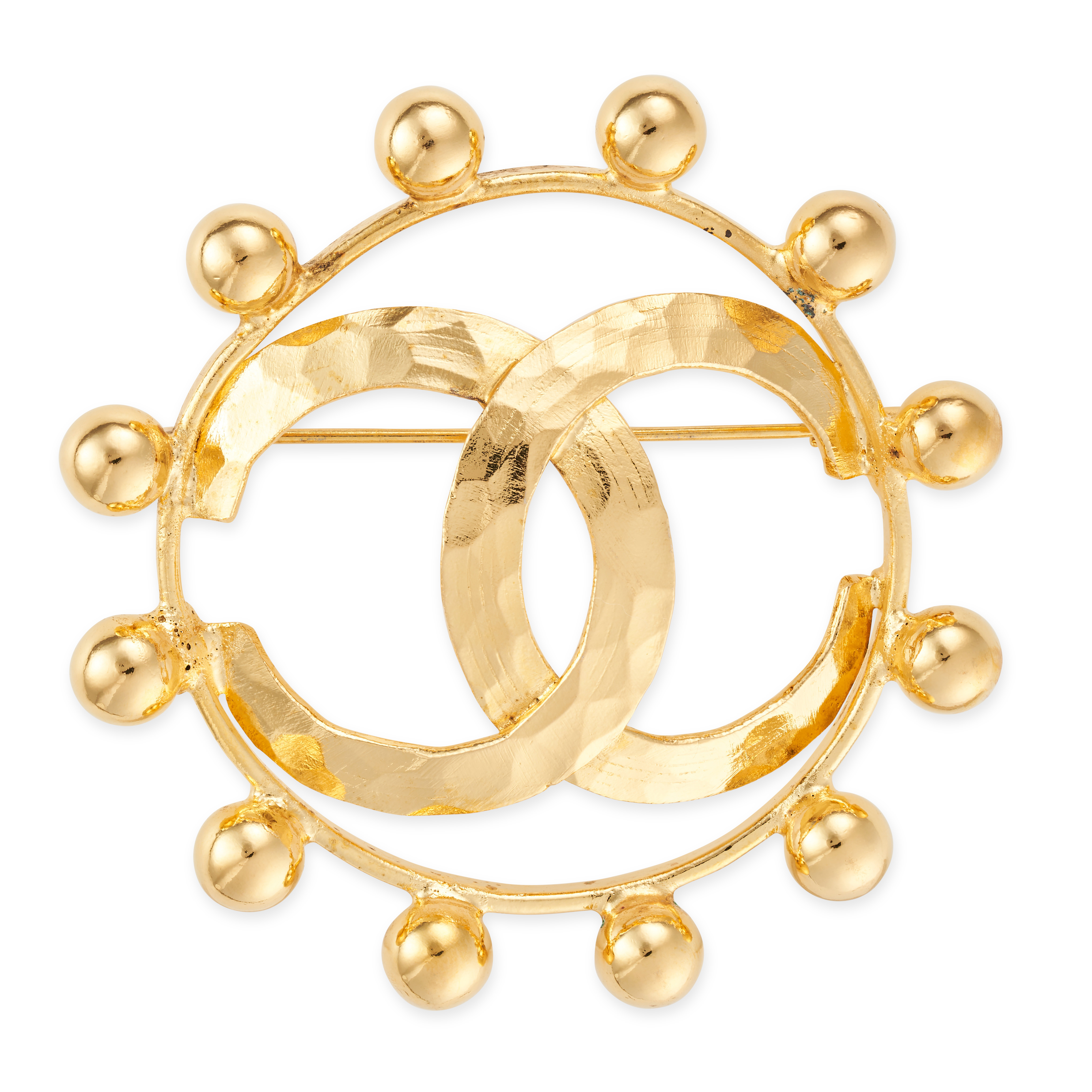 CHANEL, A LARGE CC BROOCH comprising an interlocking CC motif within a circle set with gold tone ...
