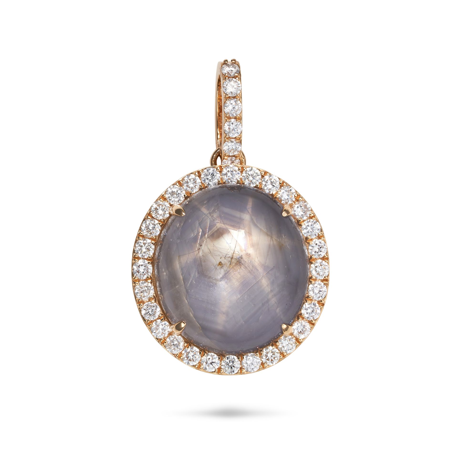 A STAR SAPPHIRE AND DIAMOND PENDANT set with a round cabochon star sapphire of 39.82 carats in a ...