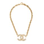 CHANEL, A CRYSTAL CC PENDANT AND CHAIN comprising a crystal embellished pendant with interlocking...