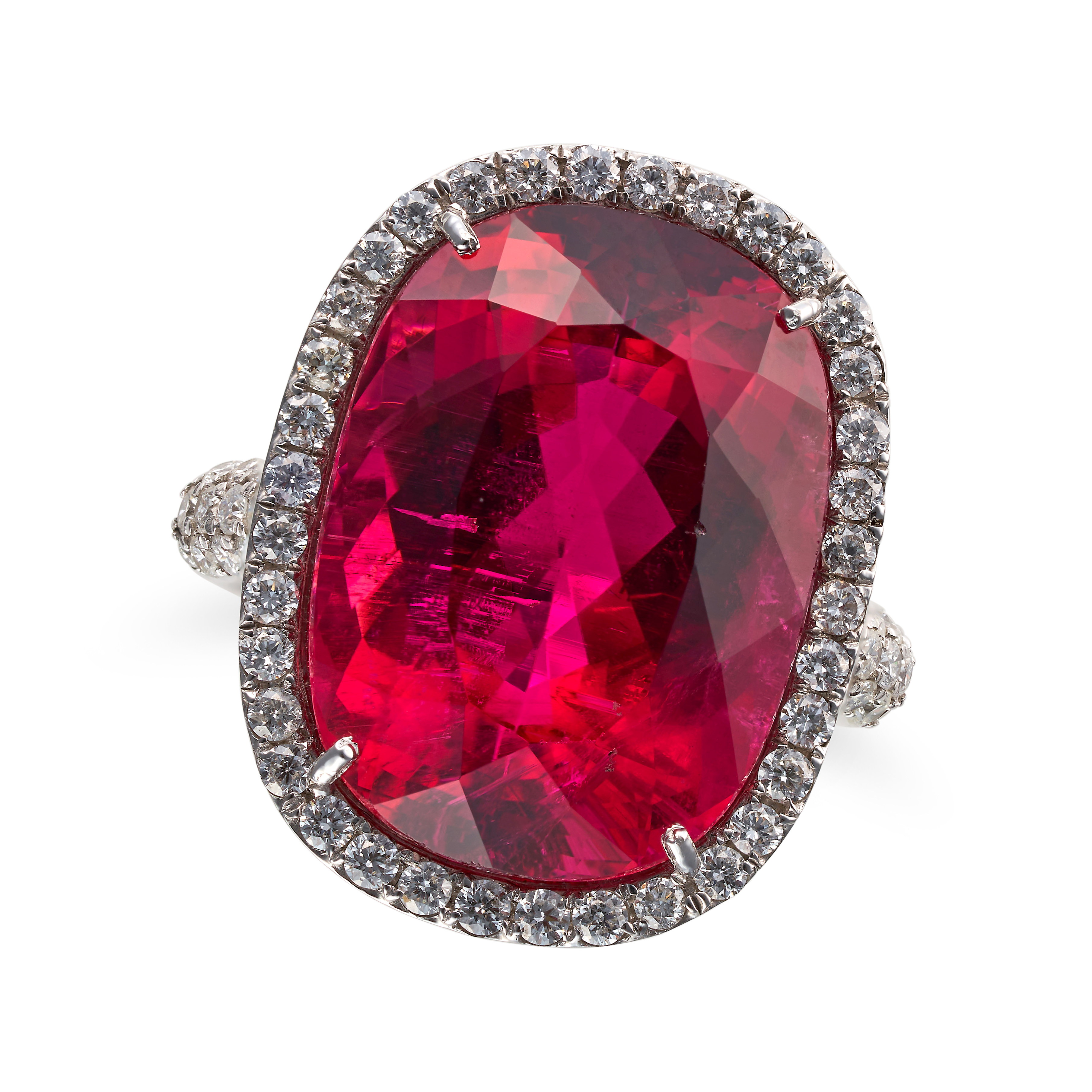 A RUBELLITE TOURMALINE AND DIAMOND RING set with a cushion cut rubellite tourmaline of 18.70 cara...