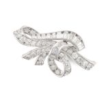 A DIAMOND BOW BROOCH, 1950S designed as a stylised bow set with single and baguette cut diamonds,...