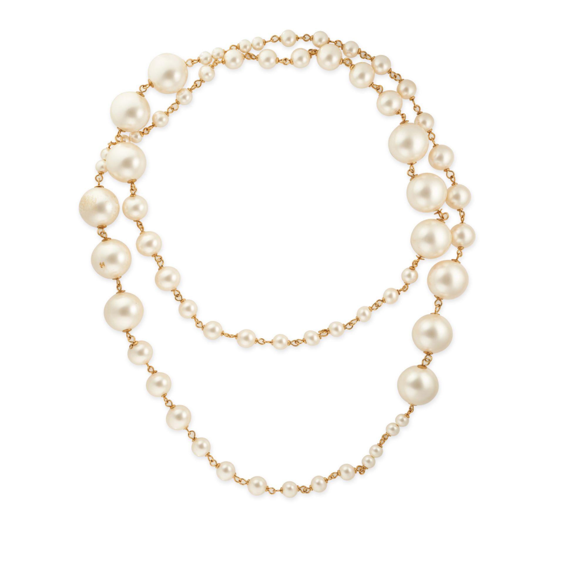 CHANEL, A LONG FAUX PEARL NECKLACE comprising a single row of faux pearls alternating in size, at...