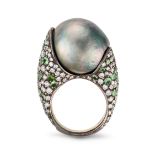 A BLACK PEARL, TSAVORITE GARNET AND DIAMOND RING set with a black pearl of 18.0mm, the mount acce...