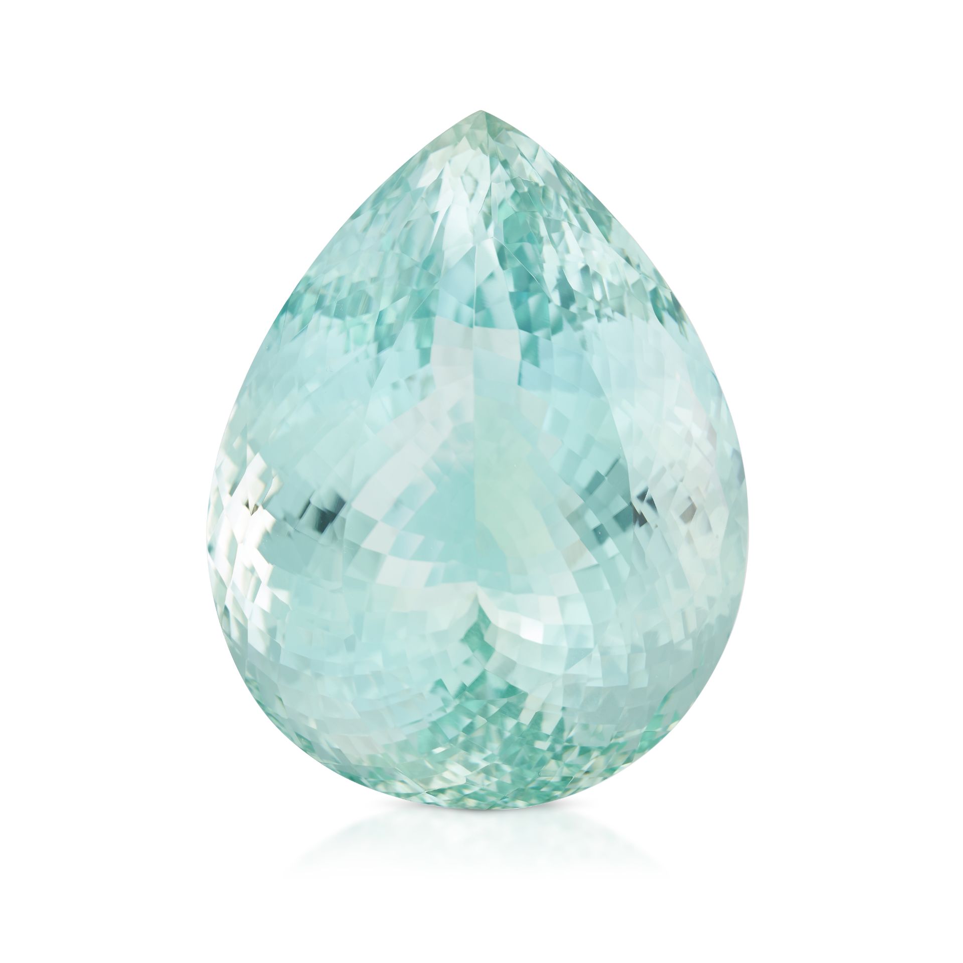 AN UNMOUNTED BLUISH-GREEN TOPAZ pear-shaped fancy cut, 310.30 carats.