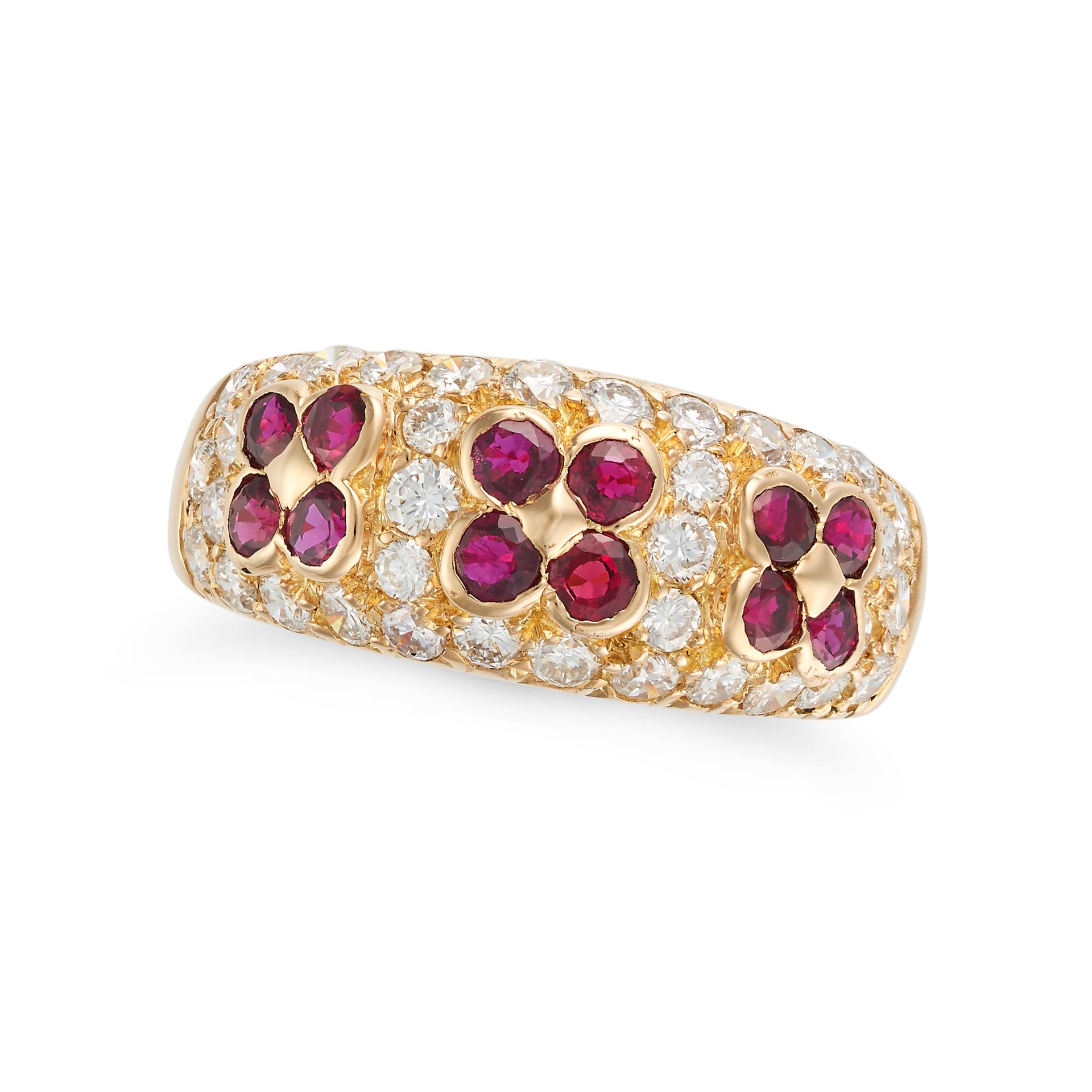 VAN CLEEF & ARPELS, A RUBY AND DIAMOND FLOWER RING in 18ct yellow gold, the bombe face set with r...