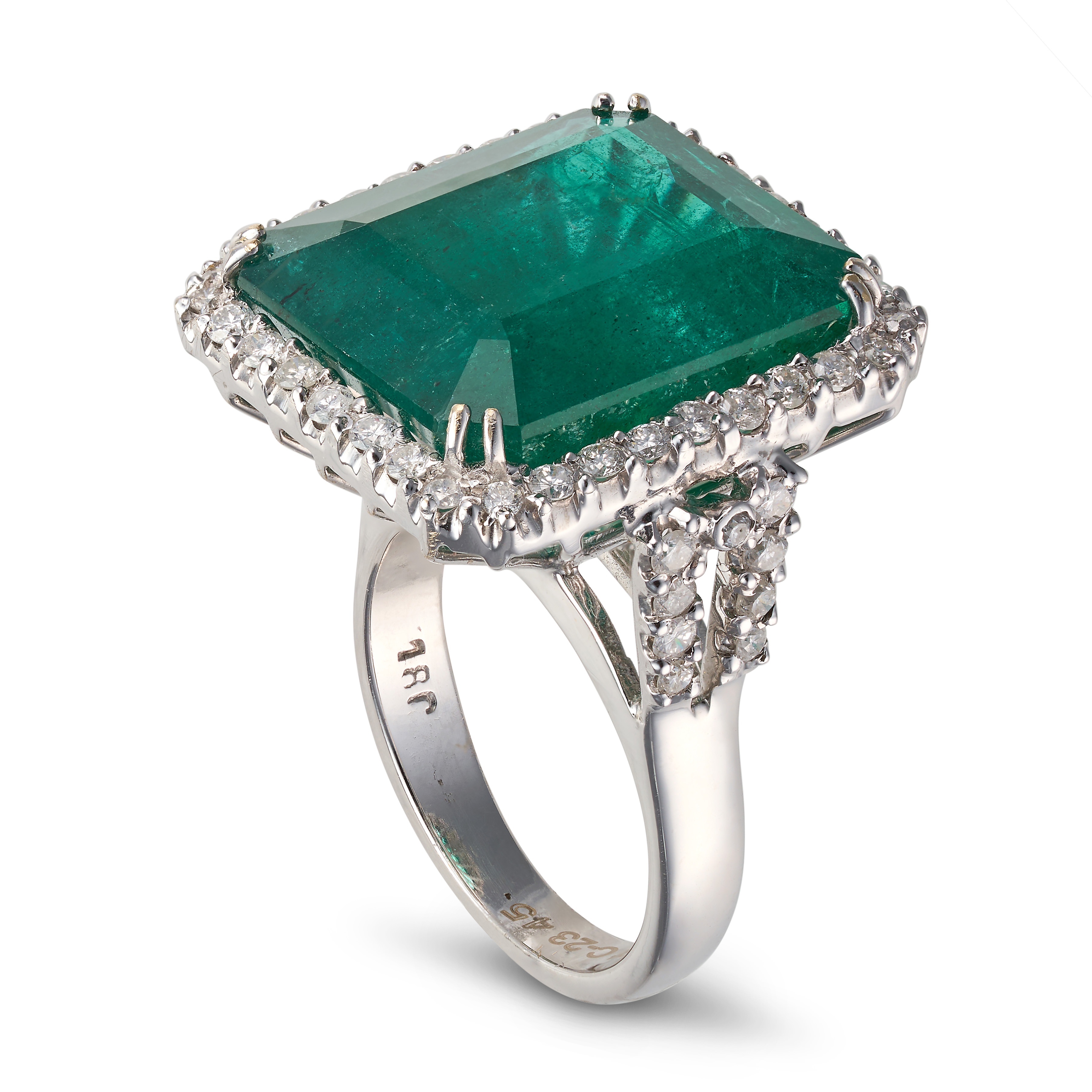AN EMERALD AND DIAMOND RING set with an octagonal step cut emerald of 23.45 carats in a border of... - Image 2 of 2