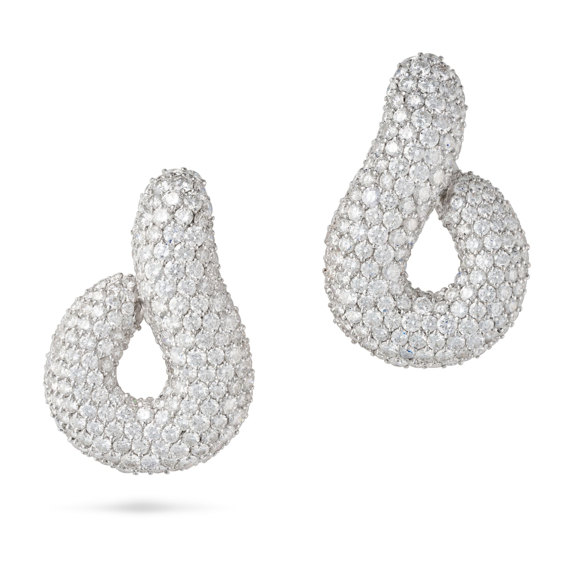 BULGARI, A PAIR OF FINE DIAMOND EARRINGS each designed as a scroll pave set throughout with round...