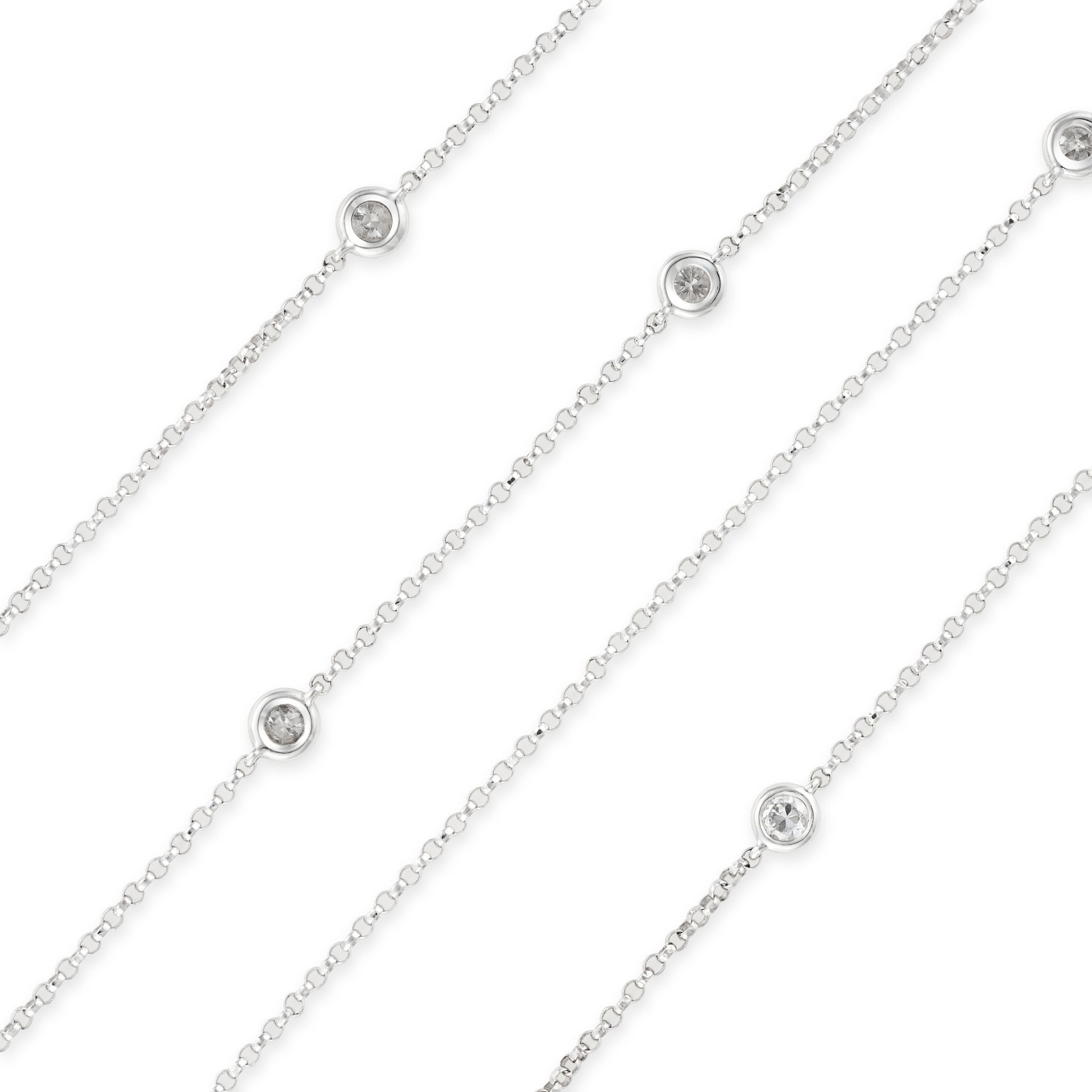 A DIAMOND CHAIN NECKLACE comprising a belcher chain set with ten staggered round cut diamonds, th...