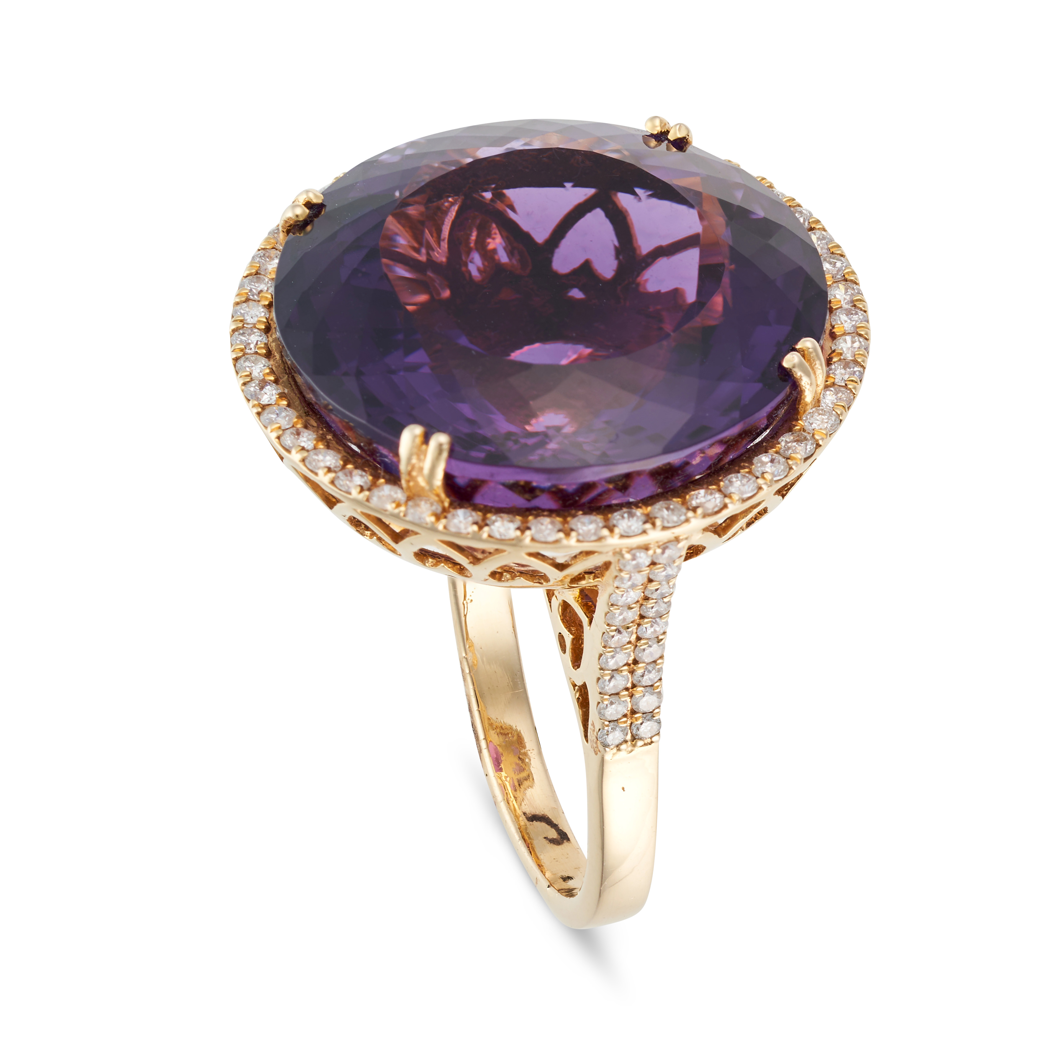 AN AMETHYST AND DIAMOND DRESS RING set with a round cut amethyst of 31.34 carats in a border of r... - Image 2 of 2