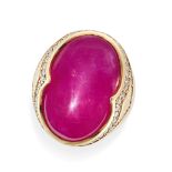 A RUBY AND DIAMOND RING set with an oval cabochon ruby in a border of round brilliant cut diamond...