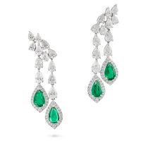 A PAIR OF EMERALD AND DIAMOND DROP EARRINGS each set with two rows of pear cut diamonds suspendin...