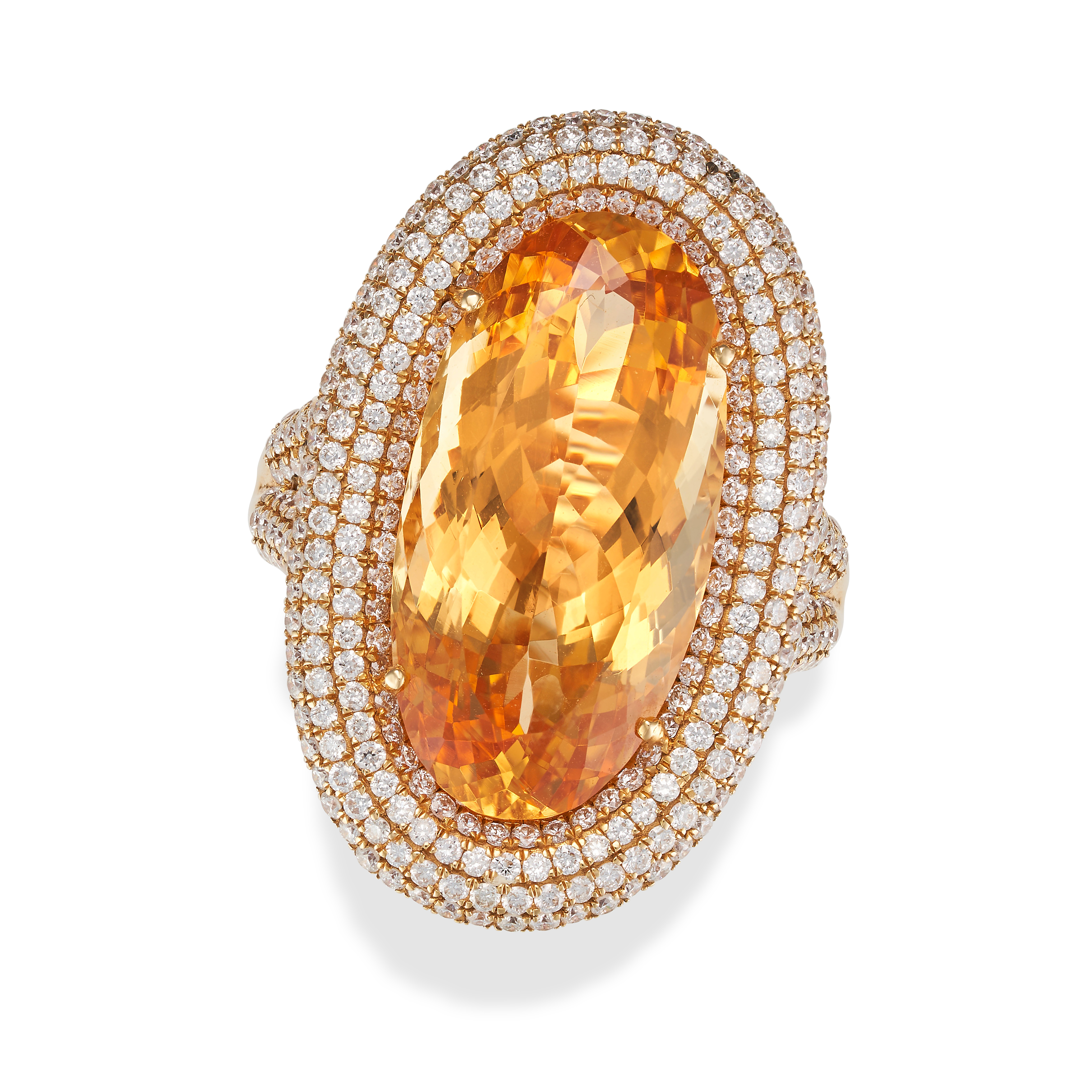 A TOPAZ AND DIAMOND RING set with an oval cut topaz of 15.52 carats in a border of pave set round...