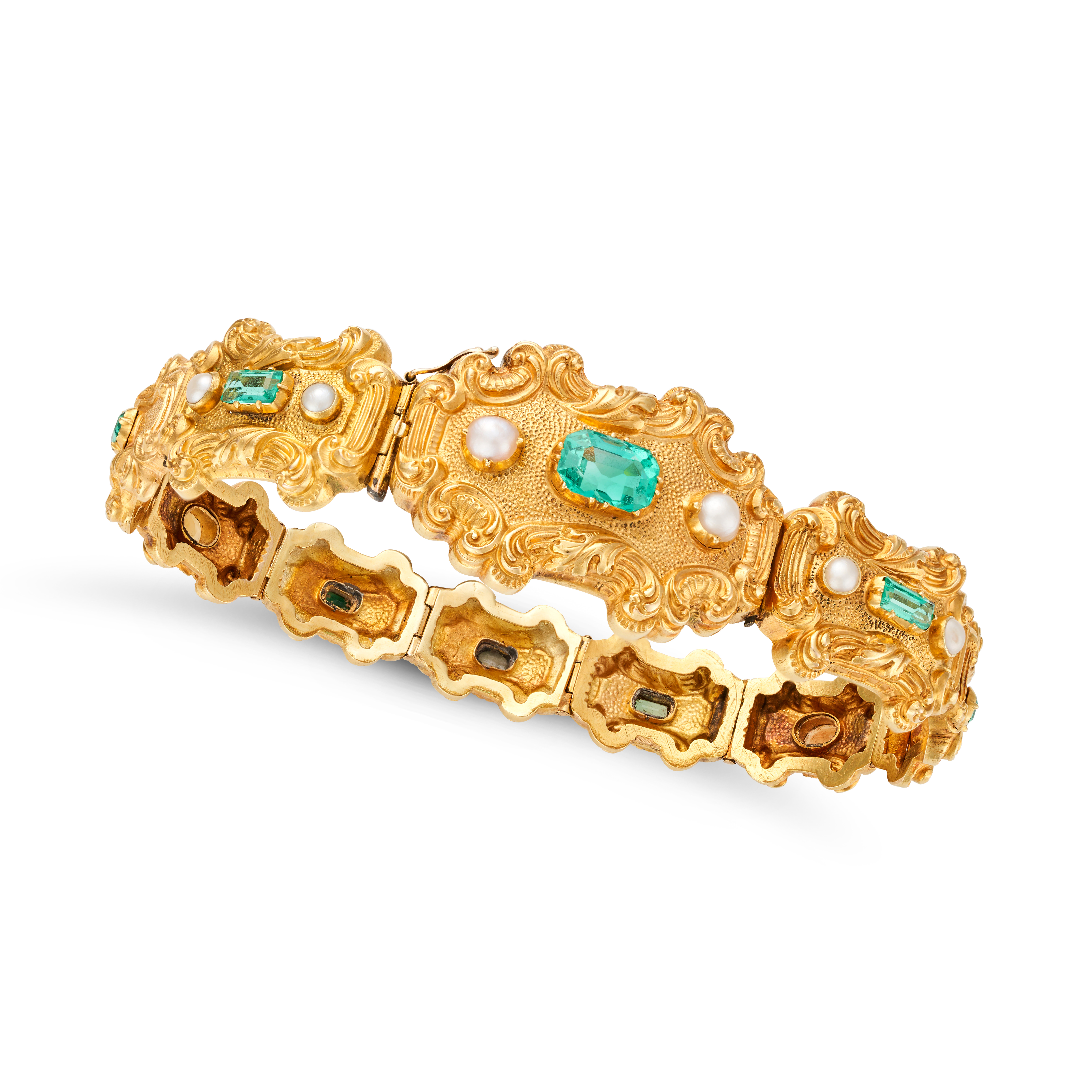 AN ANTIQUE COLOMBIAN EMERALD AND PEARL BRACELET in high carat yellow gold, comprising a row of sc...