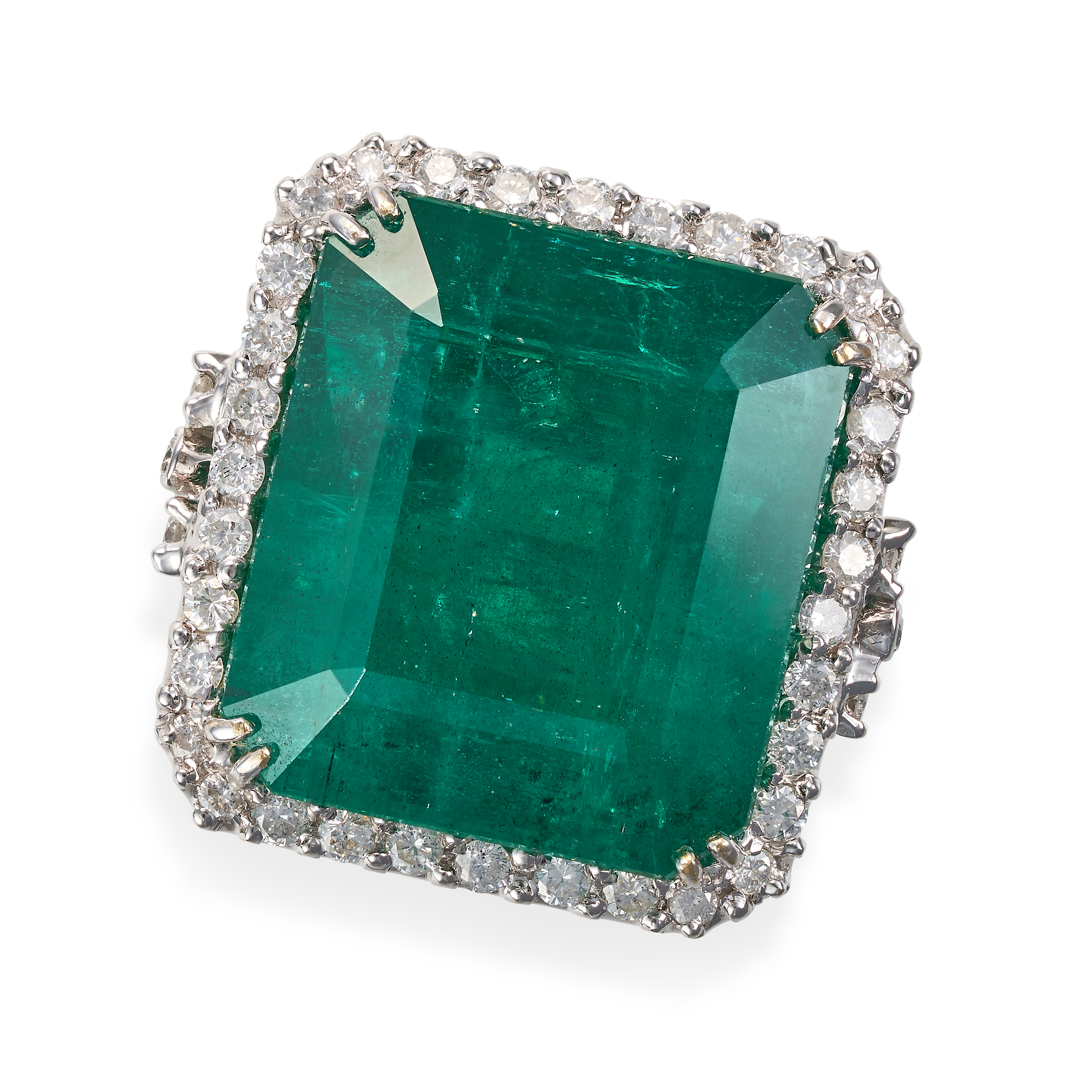 AN EMERALD AND DIAMOND RING set with an octagonal step cut emerald of 23.45 carats in a border of...