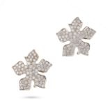 A PAIR OF DIAMOND SNOWFLAKE EARRINGS each designed as a stylised snowflake, pave set with round b...