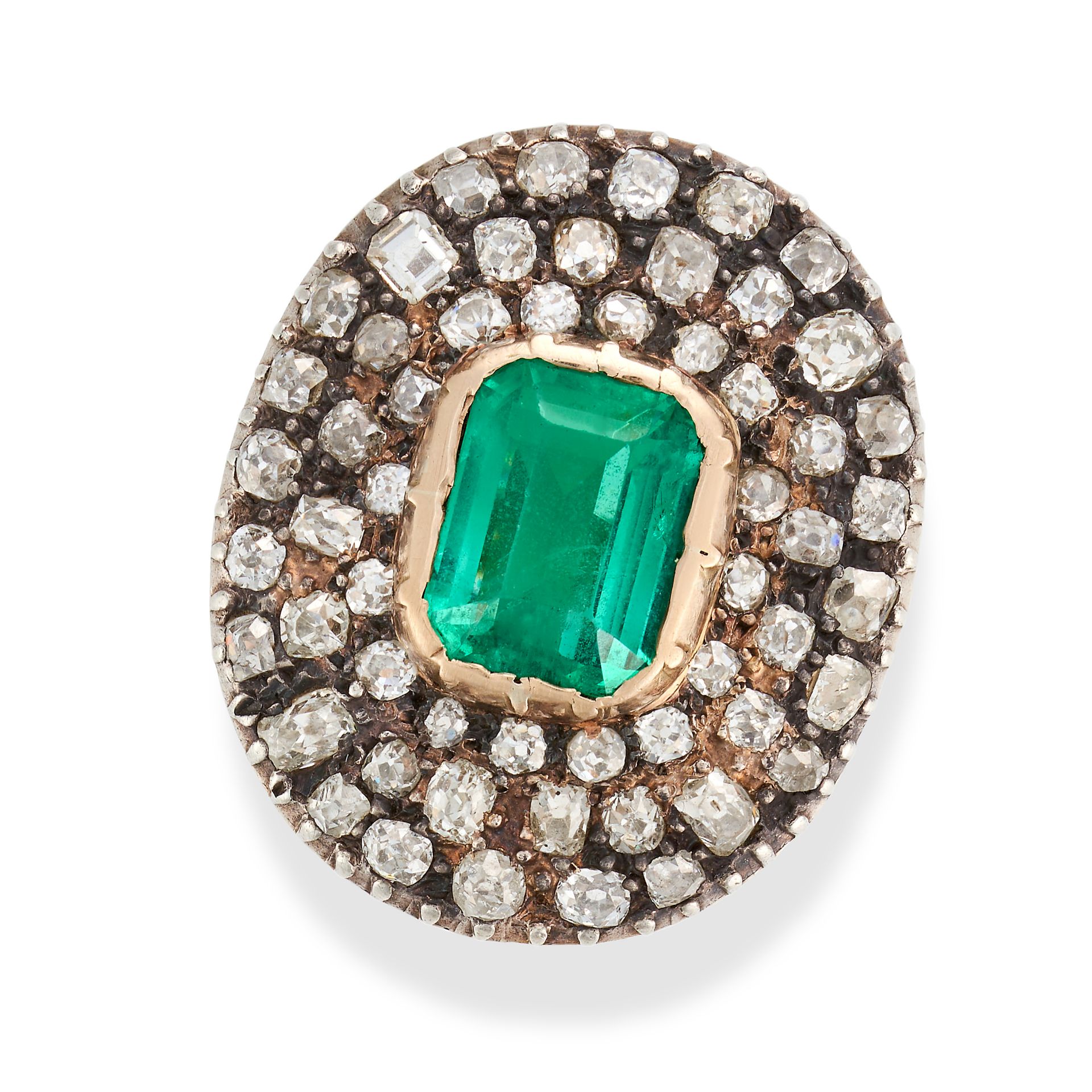 AN ANTIQUE COLOMBIAN EMERALD AND DIAMOND RING in yellow gold and silver, set with an octagonal st...