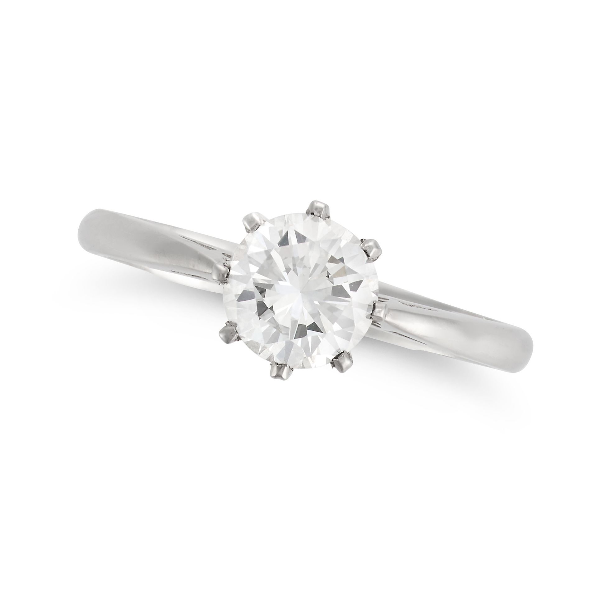 A SOLITAIRE DIAMOND RING in platinum, set with a round brilliant cut diamond of approximately 1.0...