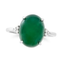 A TYPE A JADEITE JADE AND DIAMOND RING set with an oval cabochon jadeite jade, accented on each s...