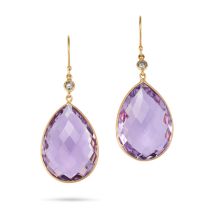 A PAIR OF AMETHYST AND DIAMOND EARRINGS each set with a round brilliant cut diamond, suspending a...