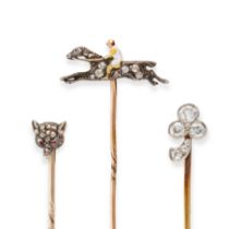 A COLLECTION OF ANTIQUE STICK / TIE PINS comprising a fox head set with rose cut diamonds and rou...