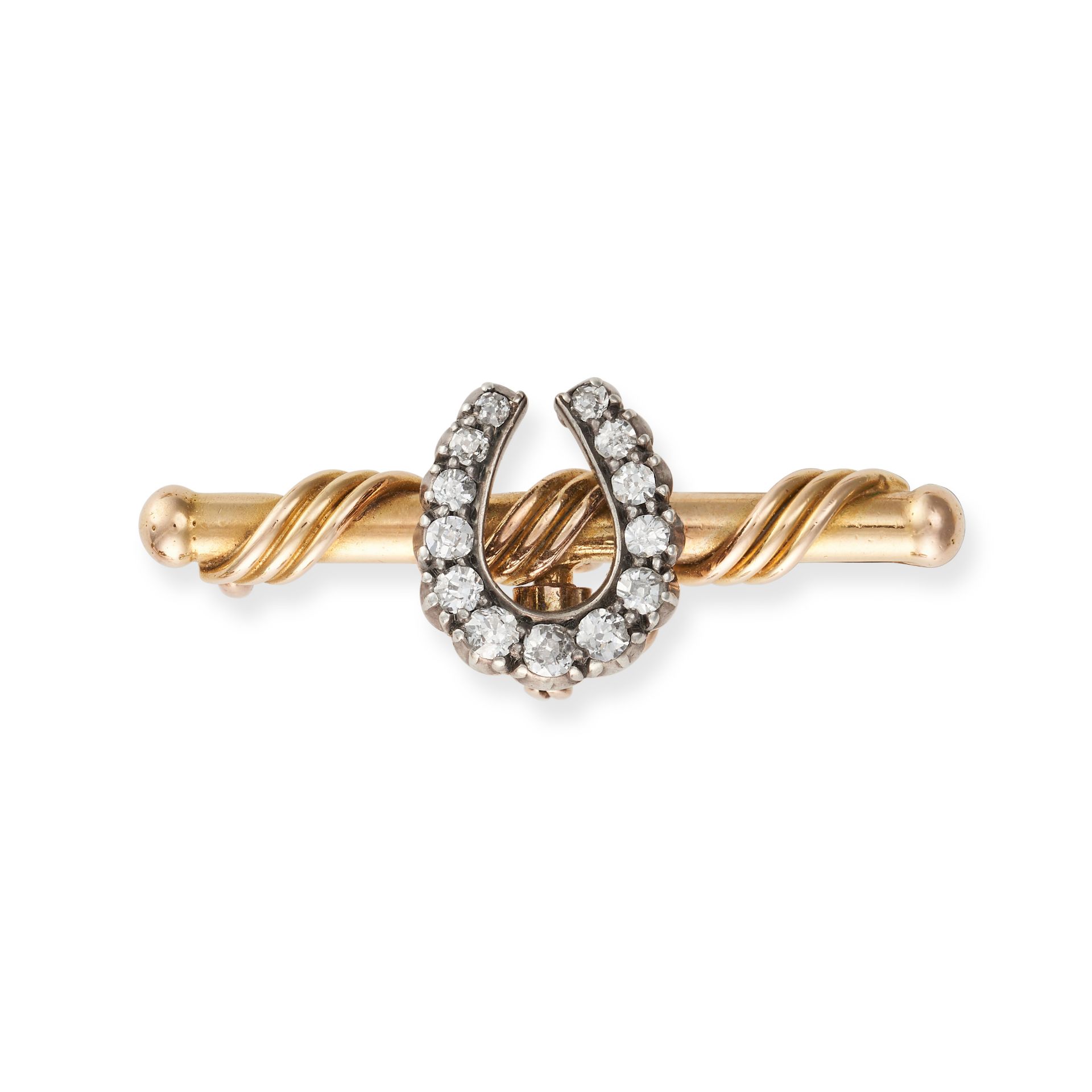 AN ANTIQUE DIAMOND HORSESHOE BAR BROOCH designed as a horseshoe set with old cut diamonds, on a t...