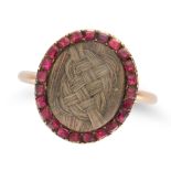 AN ANTIQUE GEORGIAN GARNET AND HAIRWORK MOURNING RING set with hairwork beneath a glass panel, in...