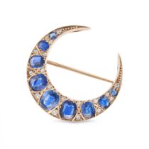 AN ANTIQUE SAPPHIRE AND DIAMOND CRESCENT MOON BROOCH in yellow gold, designed as a crescent moon,...