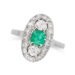 AN EMERALD AND DIAMOND DRESS RING set with a cushion cut emerald accented on each side by a round...